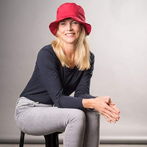 Chapeau de pluie en Gore Tex femme rouge pour se déplacer à vélo Seeberger